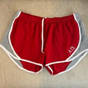 Red Alpha Gamma Delta running shorts